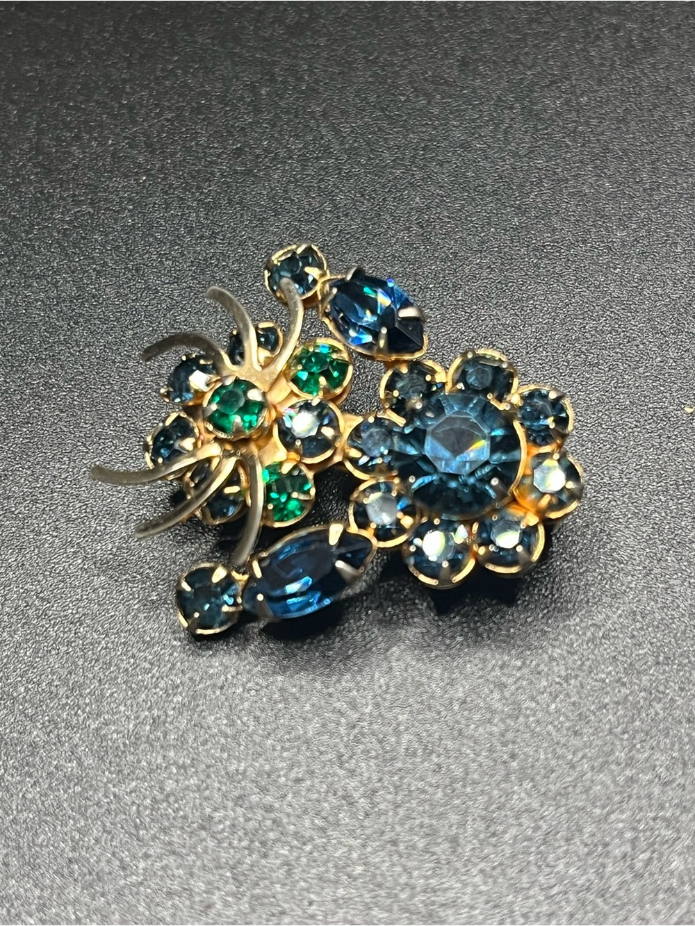 Vintage blue green rhinestone floral spray brooch